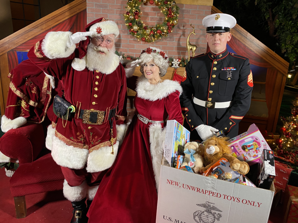 Santa True and Mrs. Claus help out the USMC collect toys Santa True and Mrs. Claus help out the USMC collect toys